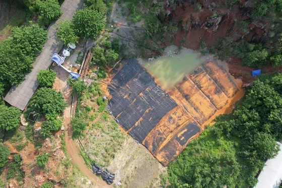 PENGURANGAN KADAR AIR DENGAN GEOTEXTILE TUBE DIGUNAKAN UNTUK MEMBANTU MENGUBAH LUMPUR LIMBAH PABRIK KELAPA SAWIT MENJADI PUPUK