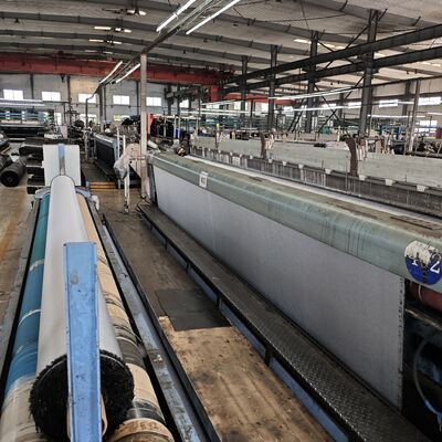 Kain Geotekstil Woven Industri yang dirancang untuk mencegah erosi tanah dan perpindahan agregat dalam aplikasi infrastruktur