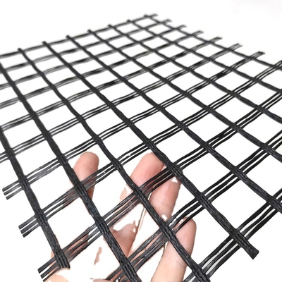 Biaxial Fiberglass Geogrid Benang Bitume Perbaikan Jalan Alkali Resistant Reinforcing Mesh